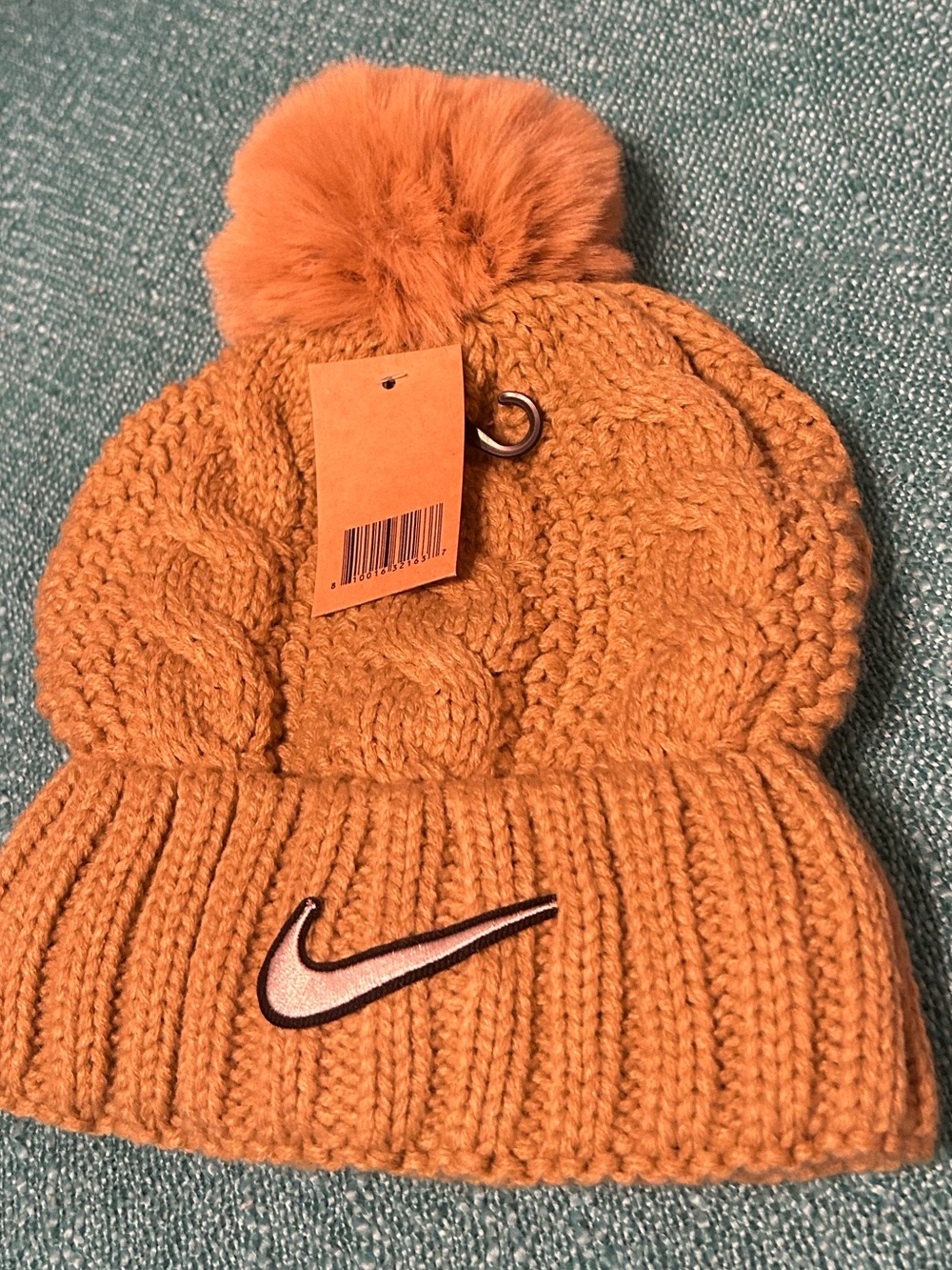 Nike women’s PomPom head gear 100% Acrylic OS fits Most Tan color